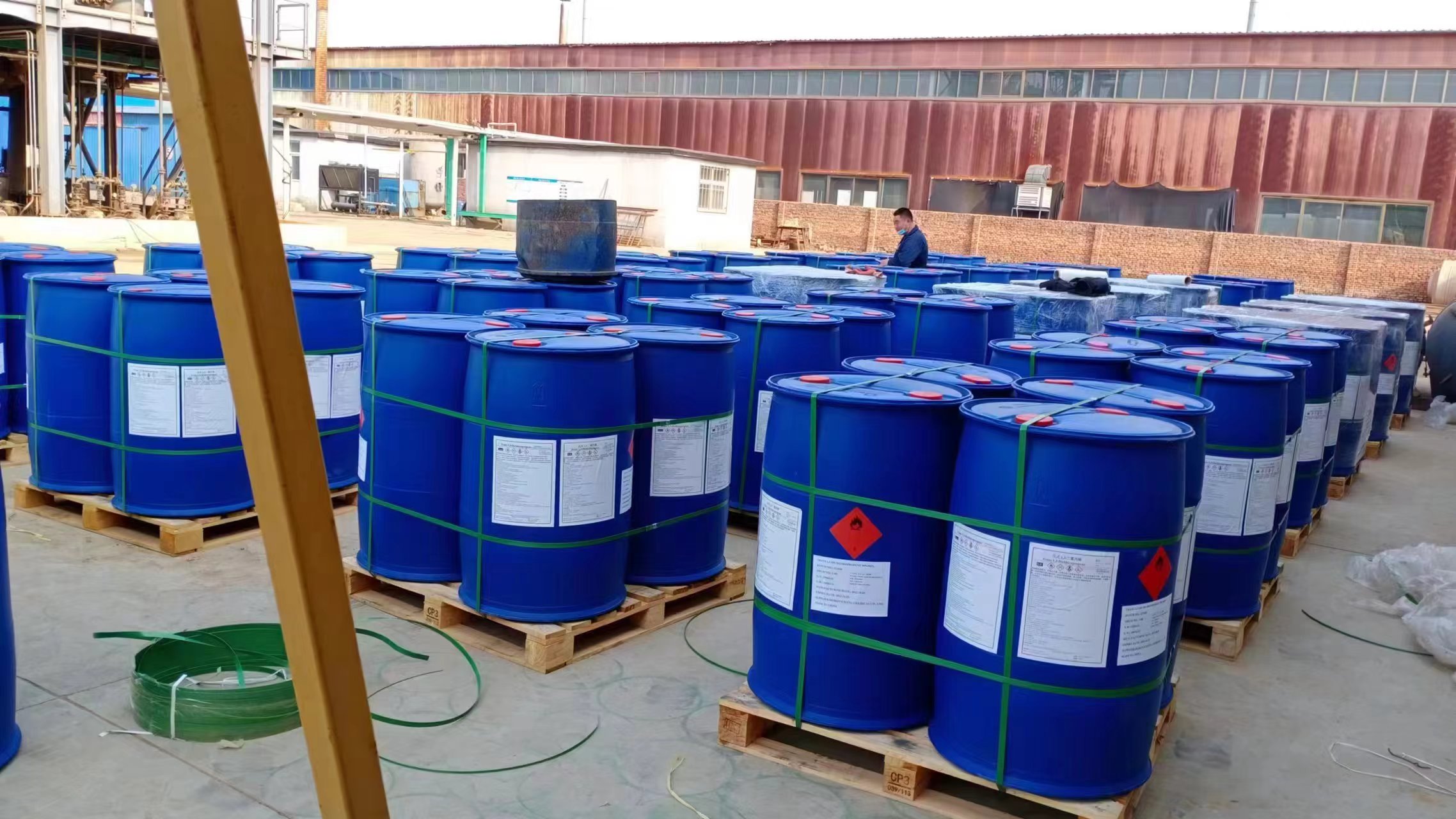 Blue drums in a warehouse from the company presentation